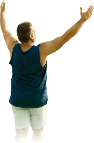 Man in blue tank top holding up his arms in celebration
