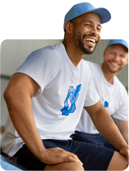 Man wearing baseball hat.